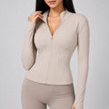 jaqueta-esportiva-feminina-gola-alta-com-ziper-modelagem-slim-manga-longa-para-treino-e-inverno-cor-08-bege